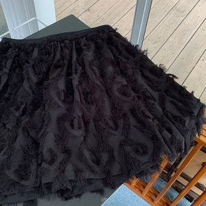 H&M black circle skirt with fun thread fringy detail. Lined. Sz 10